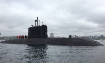 HMCS Windsor, one of Canada's four Victoria-class submarines, heads out the harbour in Halifax on Thursday, May 26, 2016. (Todd Battis / CTV News)