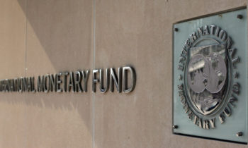 (FILES): This April 5, 2007 file photo shows the International Monetary Fund logo at IMF headquarters on Pennsylvania Avenue in Washington, DC. The IMF announced November 2, 2009 the sale of 200 tonnes of gold to India's central bank, nearly half the amount targeted for sale over the coming years to shore up IMF finances.  The total sales proceeds are equivalent to 6.7 billion dollars, the IMF said.   AFP PHOTO / Files / TIM SLOAN (Photo credit should read TIM SLOAN/AFP/Getty Images)