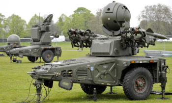 British Army Gunners from 16 Regiment, Royal Artillery, set up a Rapier FSC Ground Based Air Defence (GBAD) system at Blackheath, London on 2 May 12.   The Rapier is one of six GBAD systems being placed around London as part of Exercise Olympic Guardian. This major military and civilian exercise is taking place to help make the London 2012 Olympic Games as safe and secure as possible. It will see a wide range of capabilities rehearsed in a deliberate and orchestrated manner over a nine-day period.   Rapier, and the smaller Starstreak system, may be deployed for the Games as part of the Air Security Plan, which aims to secure the Olympics from an airborne attack. It is just one aspect of a multi-layered plan that includes RAF Typhoon interceptor aircraft, military helicopters carrying RAF Regiment snipers, and a range of radars and sensors based around the UK. While the missiles may be the most noticeable aspect of Rapier and Starstreak, their primary role will be to use their detection capabilities to provide an additional ability to identify unauthorised aircraft in the restricted airspace around London.