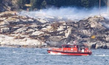 Rescuers work at a site where a helicopter crashed, west of the Norwegian city of Bergen, in April. Picture: NTB SCANPIX/BERGENS TIDENDE/VIA REUTERS