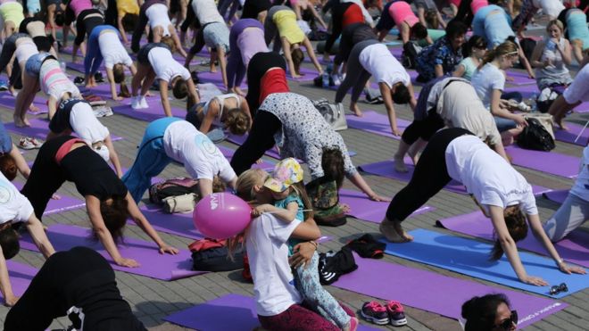 Stop traffic! Times Square in New York City, USA, comes to a standstill for a yoga session on summer solstice on Monday.