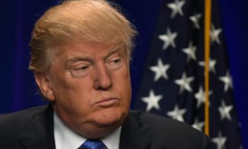 Republican presidential candidate Donald J. Trump speaks at the Saint Andelm College New Hampshire Institute of Politics in Manchester, New Hampshire June 13, 2016. / AFP / TIMOTHY A. CLARY        (Photo credit should read TIMOTHY A. CLARY/AFP/Getty Images)