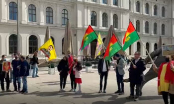 Activists in Oslo protest the governments of Iran and Turkey