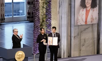 Children of Iranian activist accept her Nobel Peace Prize
